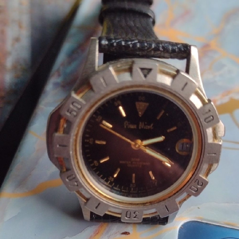 Pierre Nicol Black and Gold unisex Watch NWOT with date.Water resistant